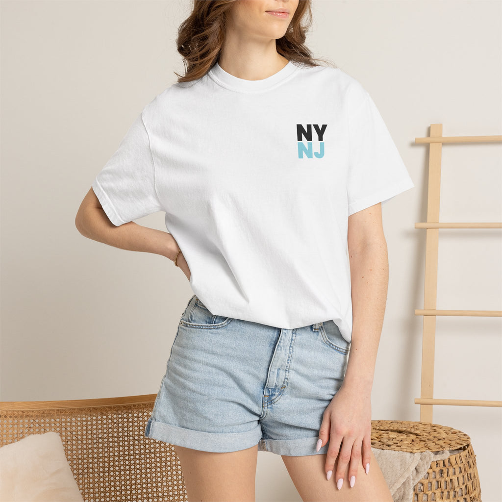 White relaxed-fit NY/NJ Statue graphic tee being worn by a model for women's pro soccer fan style.