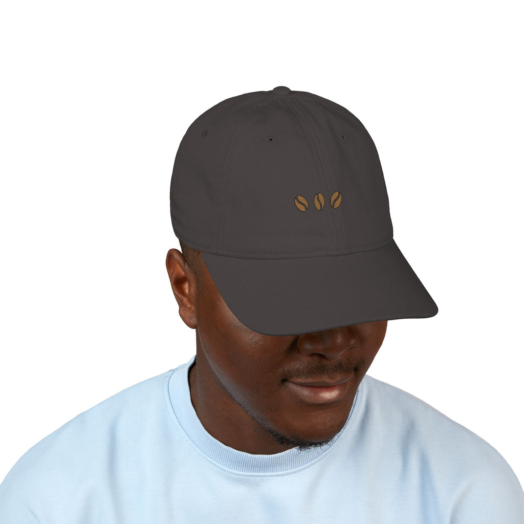 Charcoal unstructured beige baseball cap with three embroidered coffee beans across the front