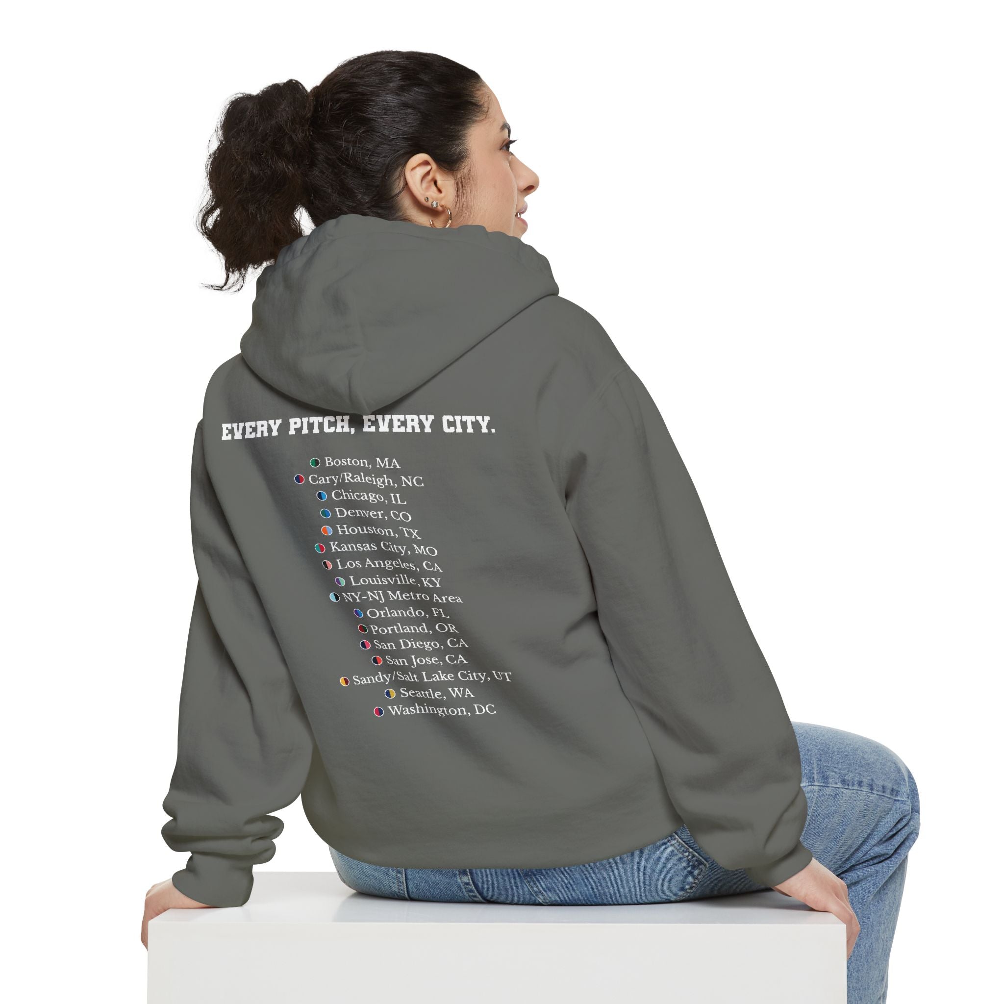 Grey hoodie with chest logo on the front and list of cities on the back