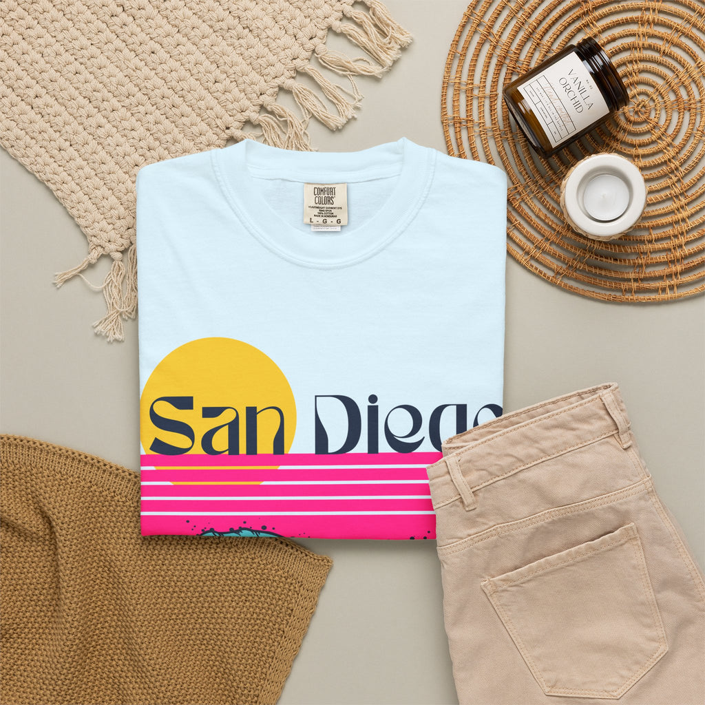 Chambray short-sleeve crewneck t-shirt featuring a retro-style sunset and ocean waves graphic with the text 'San Diego' across the chest
