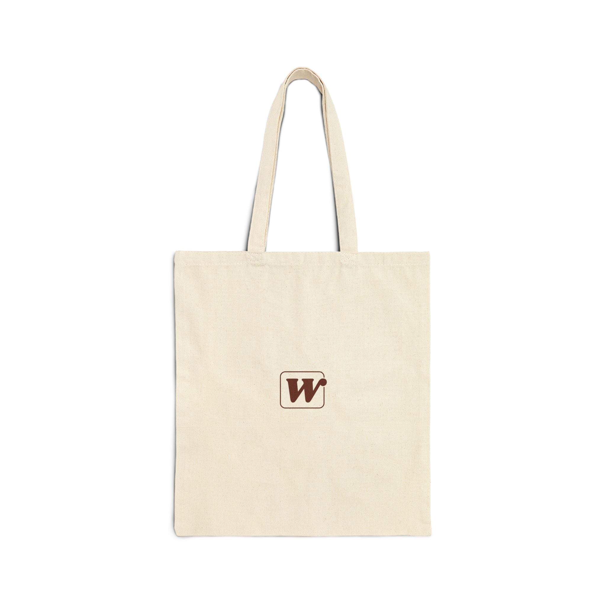 Canvas tote bag featuring an Espresso is served graphic with three clinking coffee mugs on the back and a front pocket W logo from The W-League collection