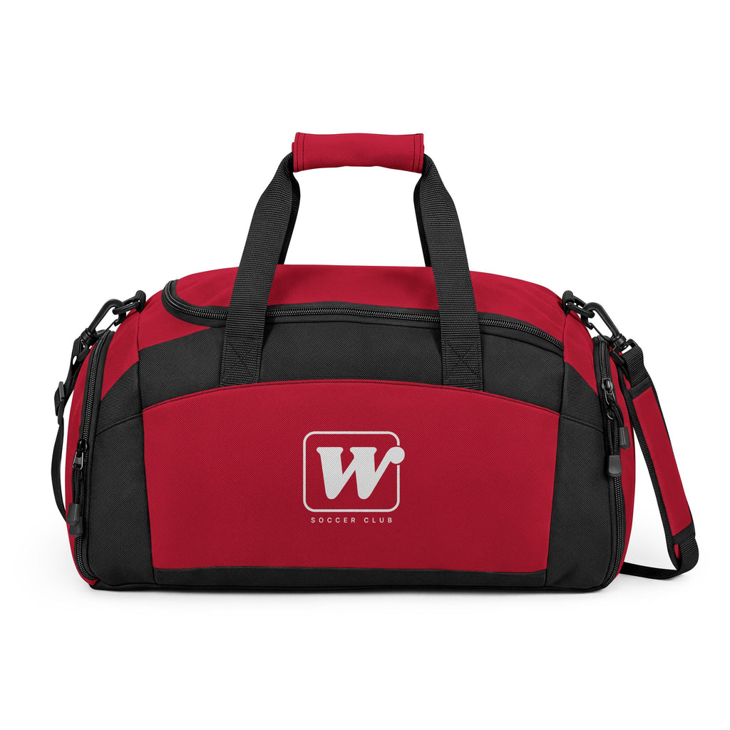 Red WSC branded athletic duffle bag featuring a large white logo print, separate ventilated shoe compartment, and water-resistant fabric