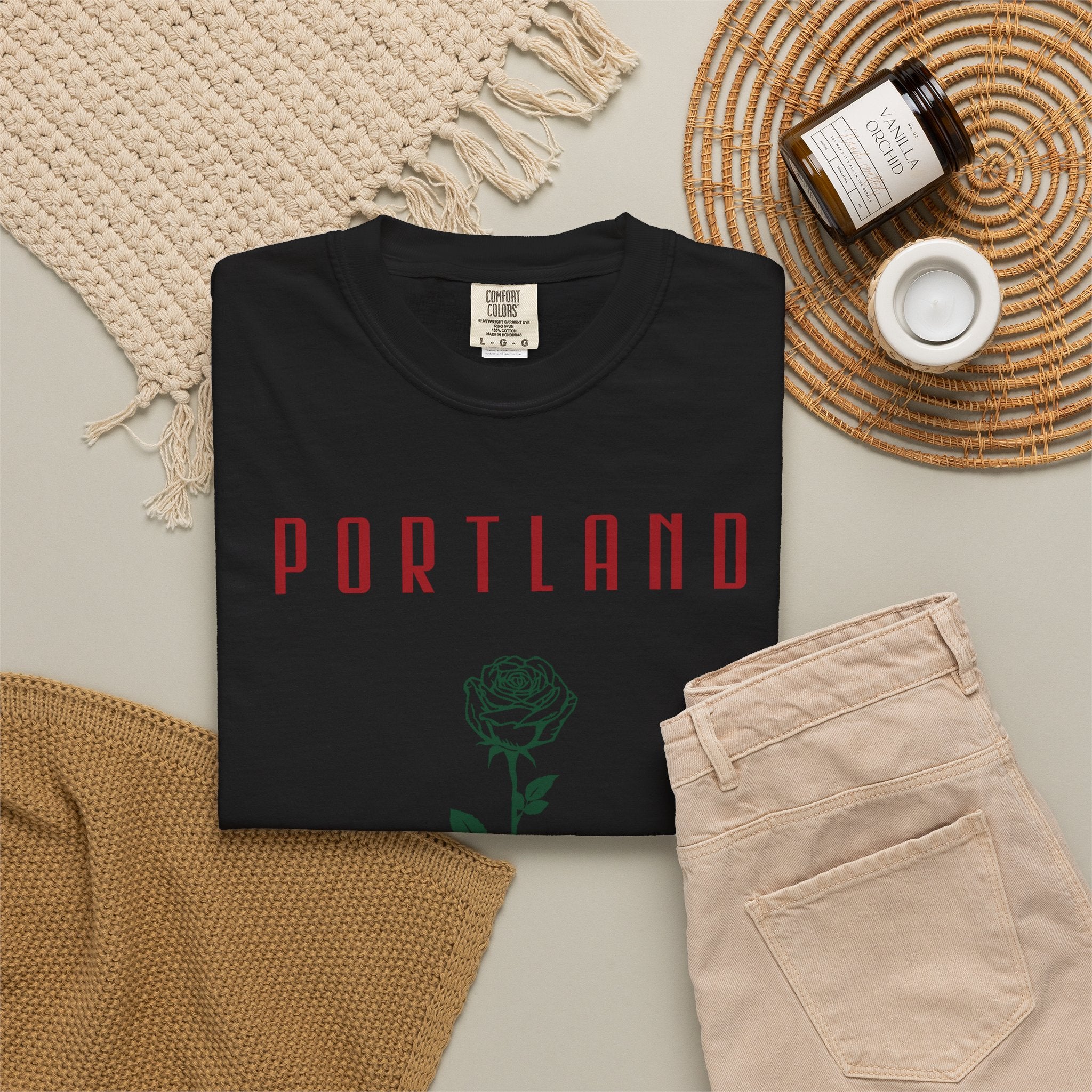 Black short-sleeve t-shirt with vintage Portland rose graphic print