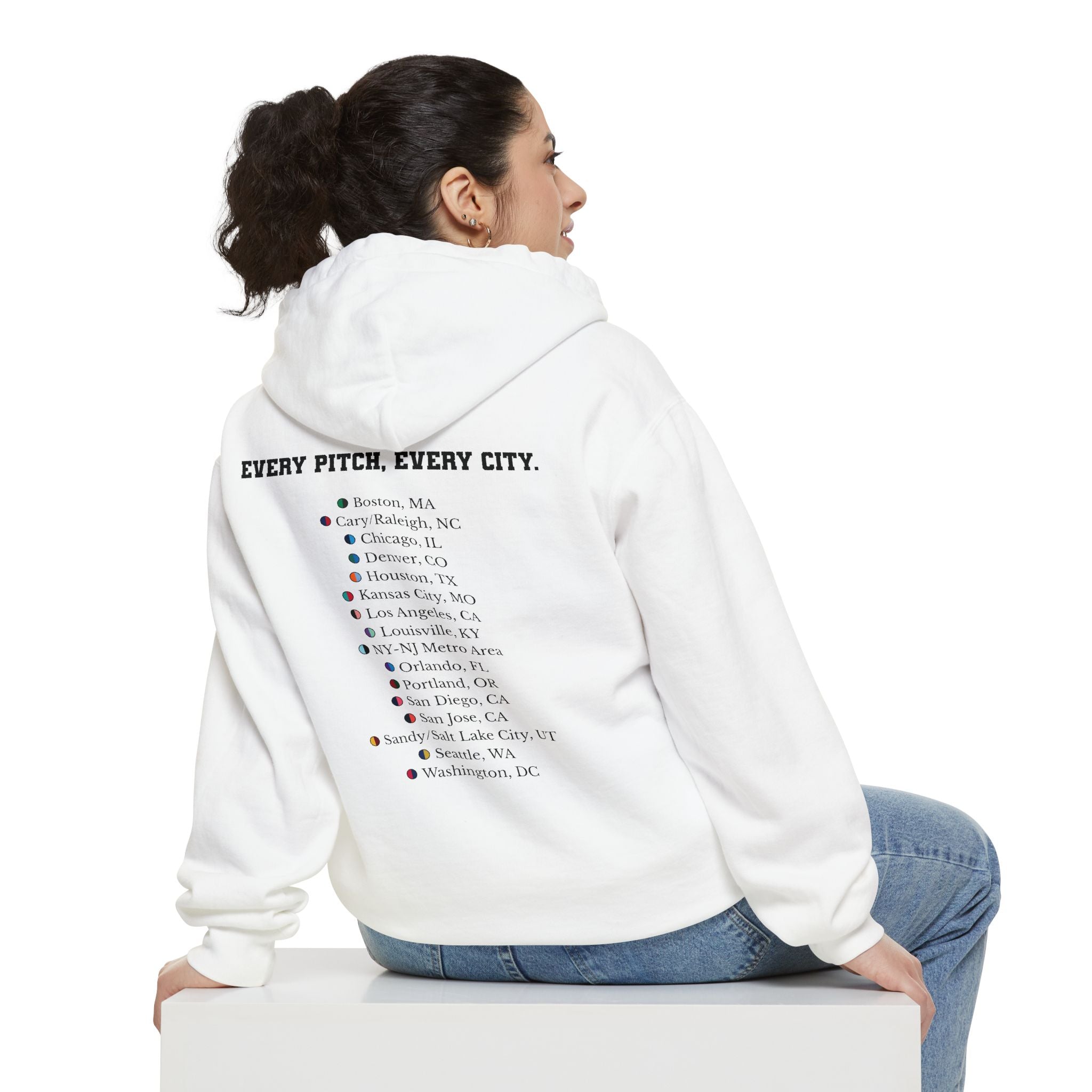 White hoodie with chest logo on the front and list of cities on the back