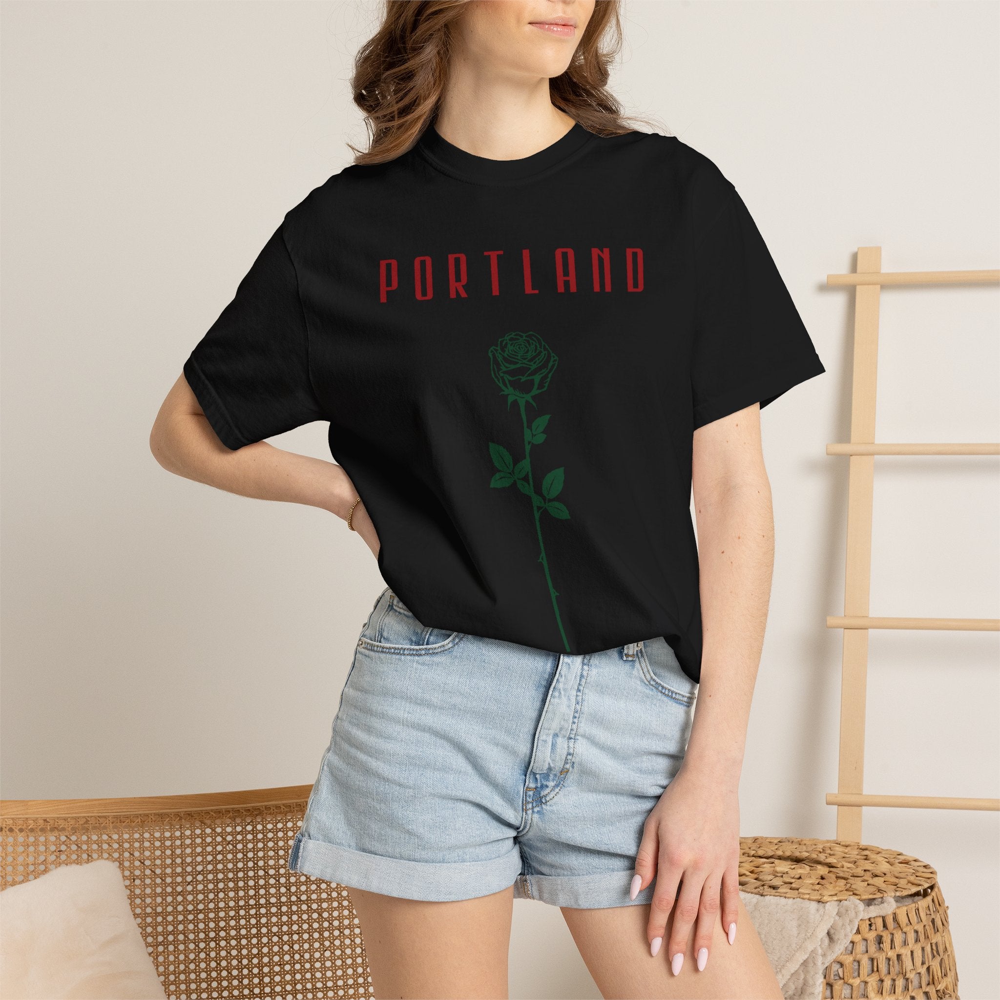 Black short-sleeve t-shirt with vintage Portland rose graphic print