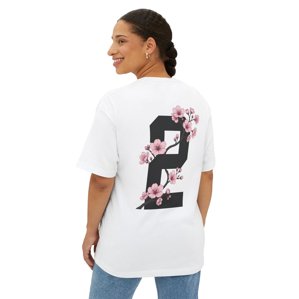 White heavyweight boxy t-shirt back view featuring a large number 2 graphic decorated with cherry blossom flowers.
