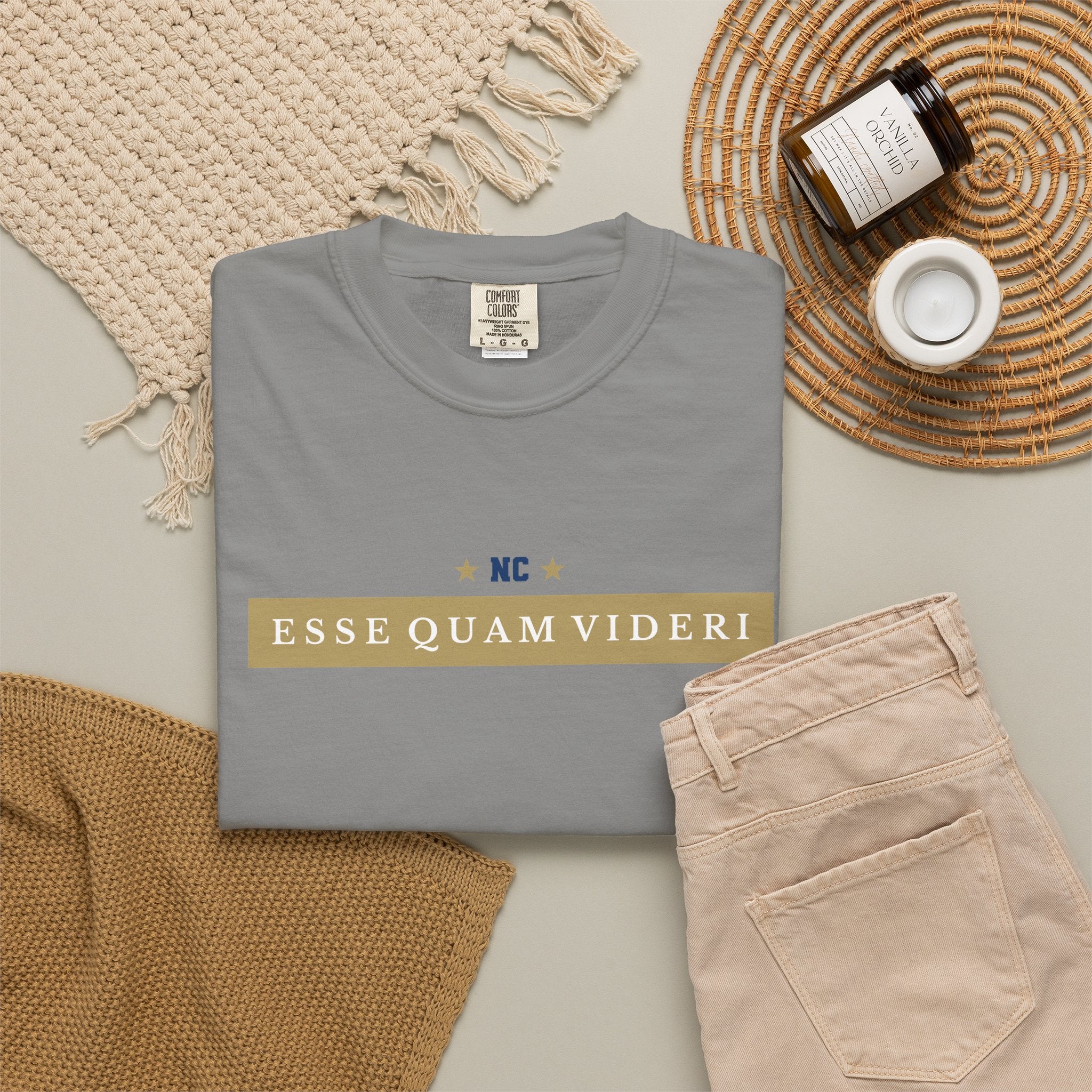 Granite gray garment-dyed t-shirt front view featuring 'ESSE QUAM VIDERI' state motto in a gold chest bar graphic.