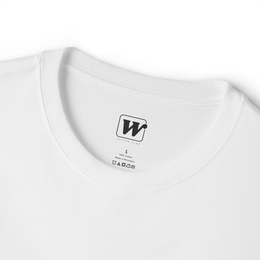 White 'Elite Company Only' boxy t-shirt close-up showing W Soccer Club logo on the inside tag
