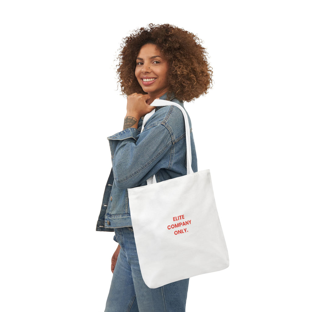 A white canvas tote bag with two shoulder straps, featuring the text 'Elite Company Only'