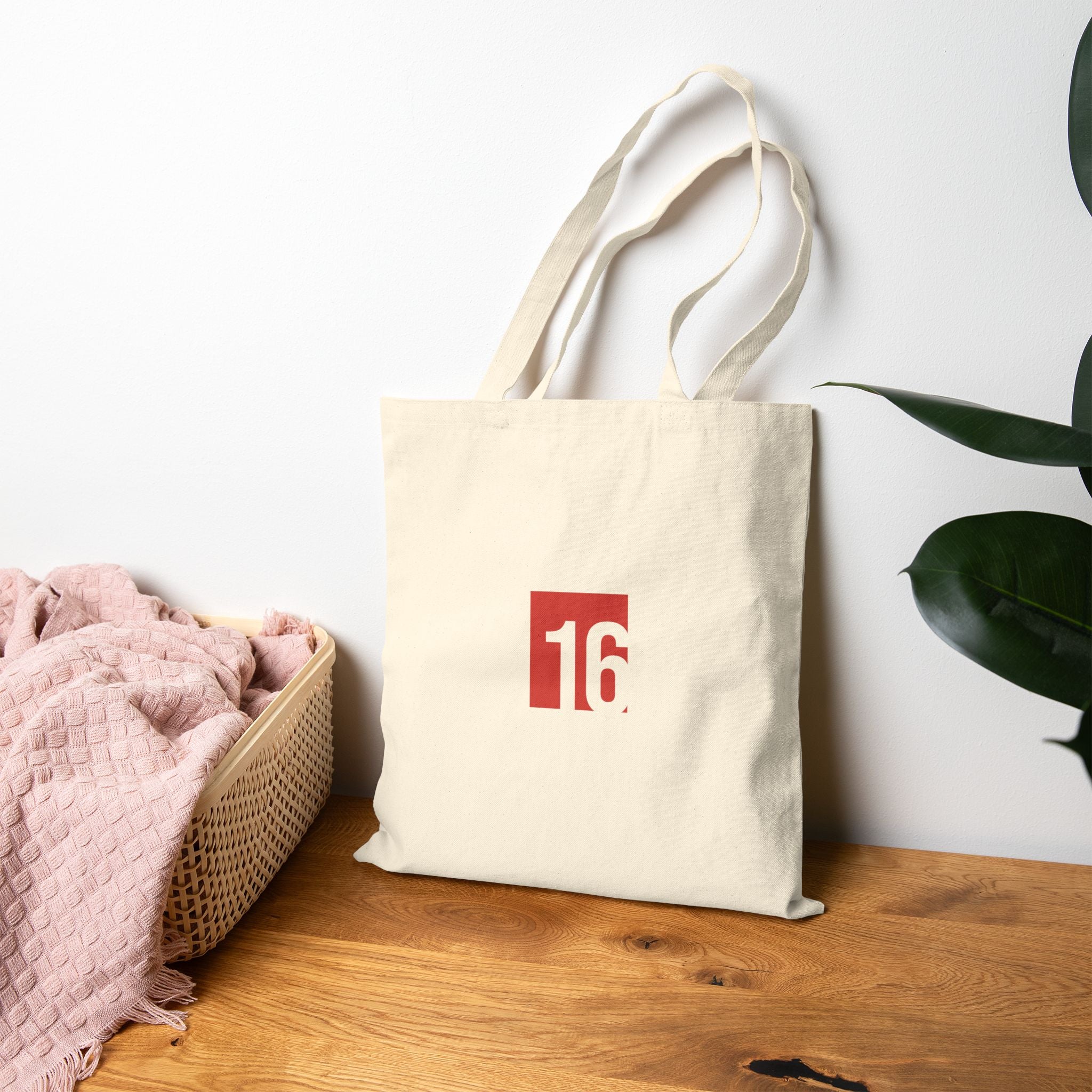 A vintage floral canvas tote celebrating modern midfield mastery and street style. Features dual-sided rose graphics and a bold #16 block.