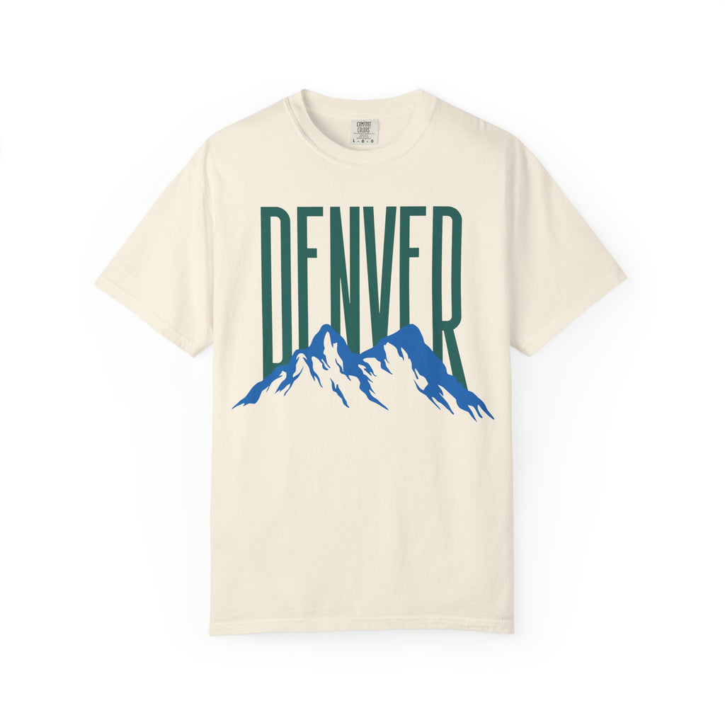 Ivory Denver mountain graphic t-shirt featuring block lettering above a blue Rocky Mountain silhouette, ideal for game day fan gear.