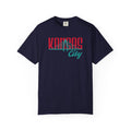Navy garment-dyed t-shirt front view featuring "Kansas City" with bridge graphic in red and teal retro script across the chest.