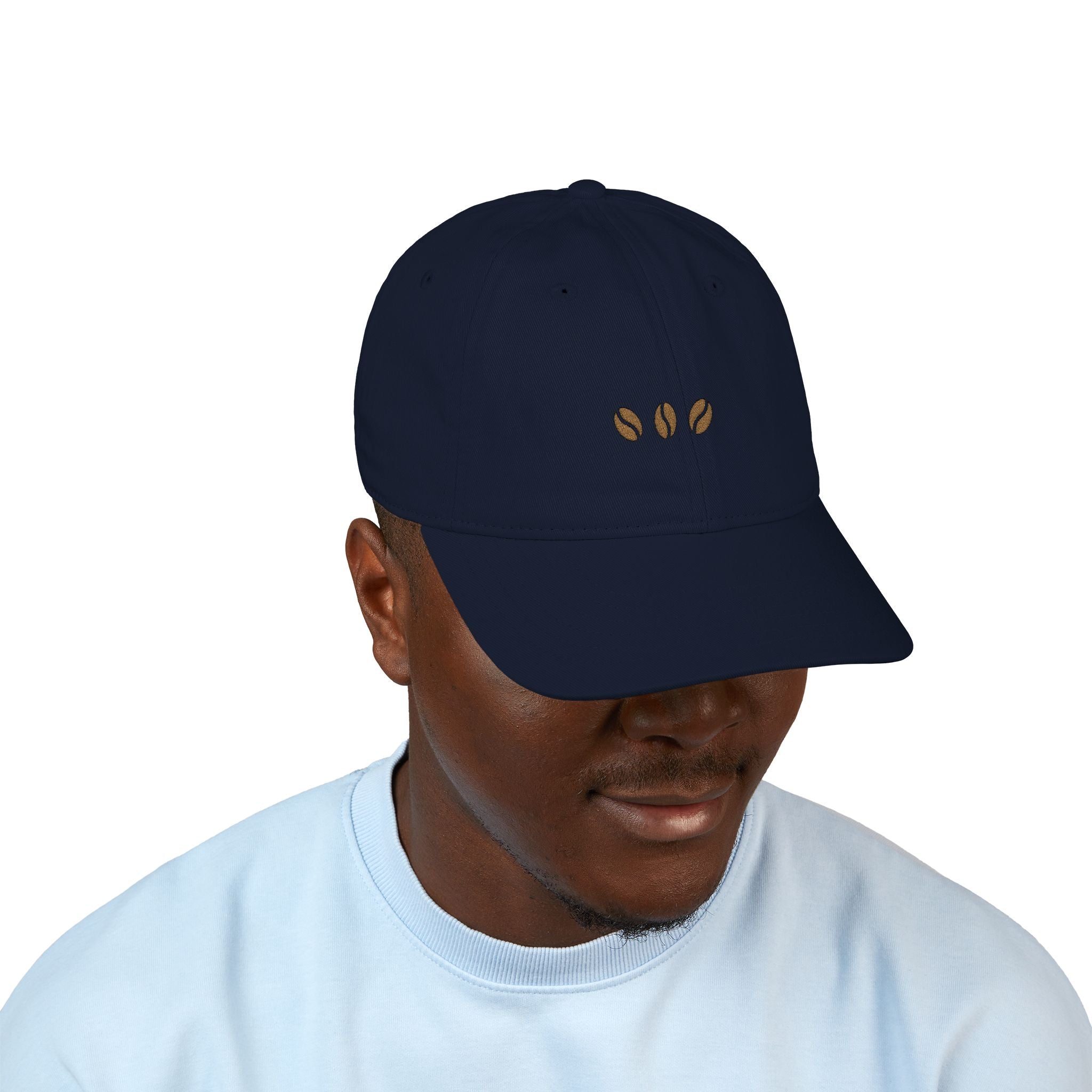 Pacific unstructured beige baseball cap with three embroidered coffee beans across the front