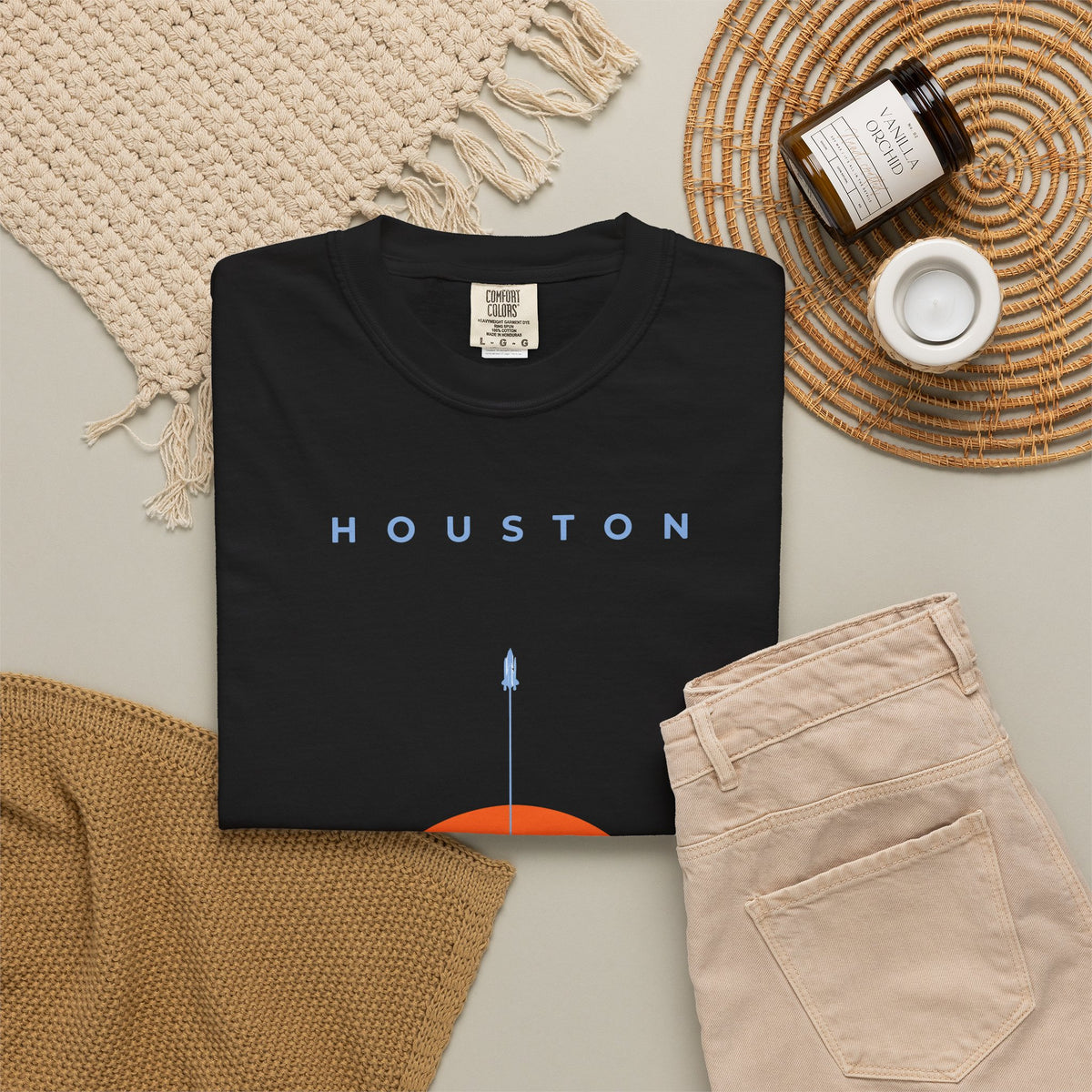 Black front detail of retro Houston soccer shirt featuring minimalist sunset graphic