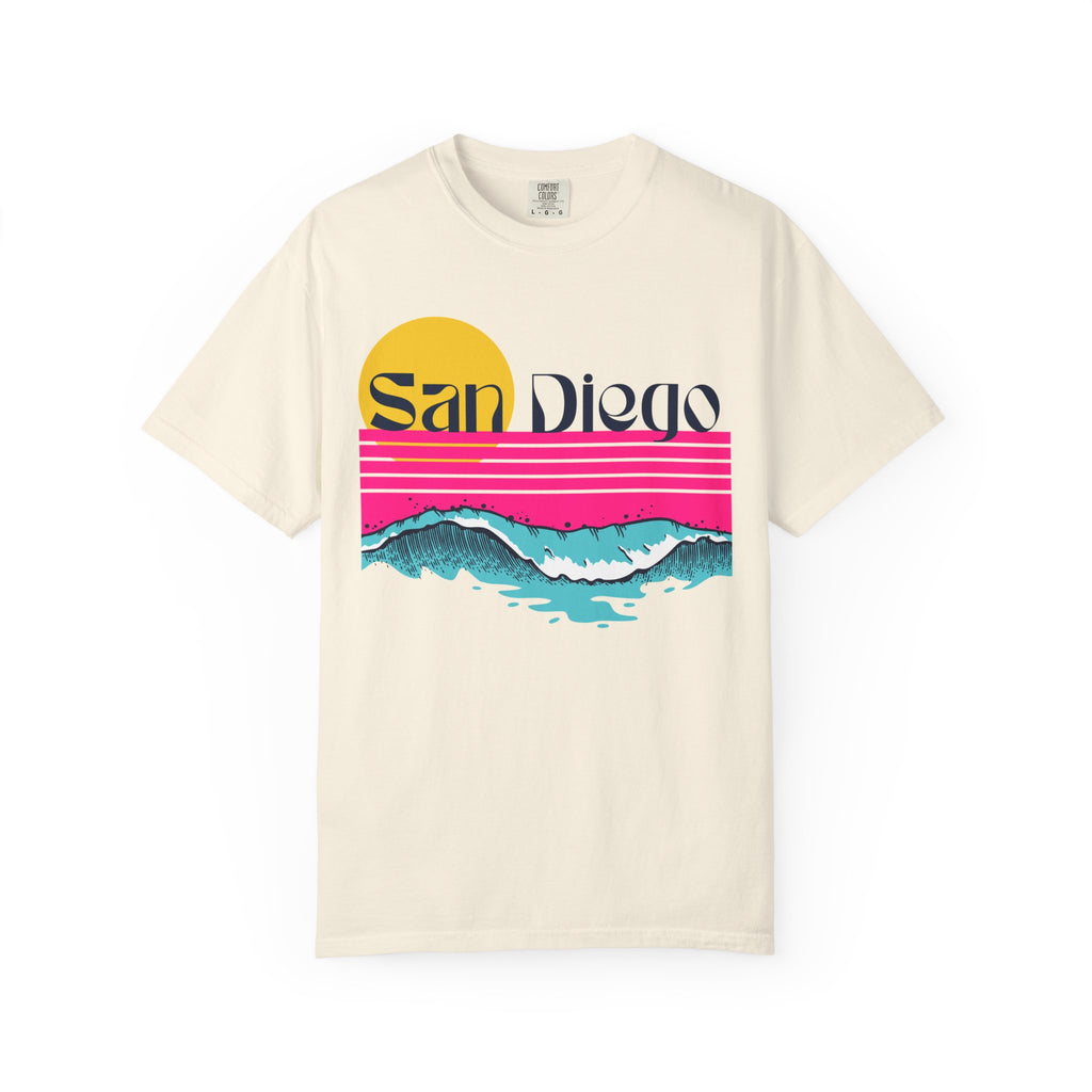 Ivory short-sleeve crewneck t-shirt featuring a retro-style sunset and ocean waves graphic with the text 'San Diego' across the chest