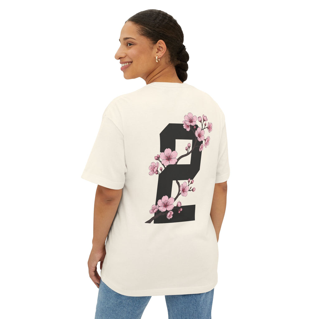 Natural heavyweight boxy t-shirt back view featuring a large number 2 graphic decorated with cherry blossom flowers.