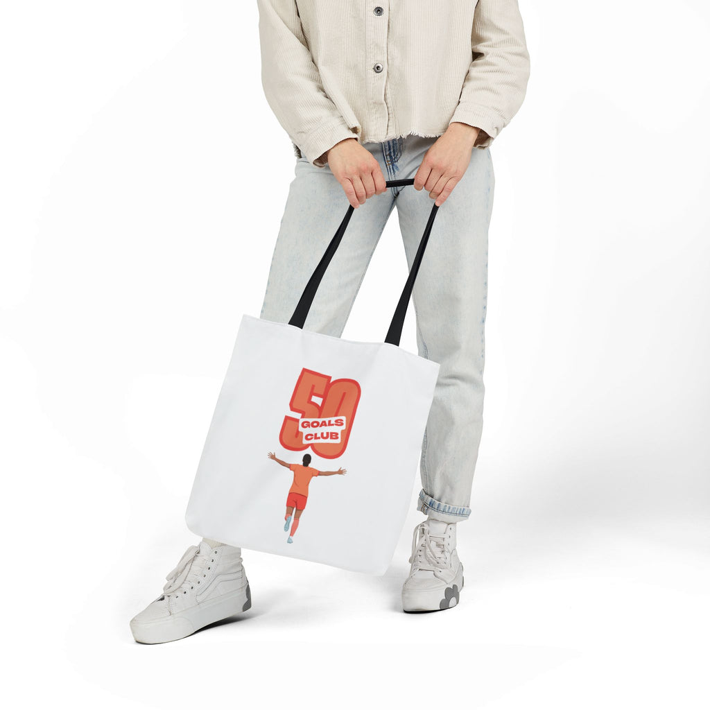 A canvas tote bag with black shoulder straps, featuring a graphic print of a player running underneath a '50 GOALS CLUB' design.