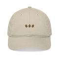 Oyster unstructured beige baseball cap with three embroidered coffee beans across the front