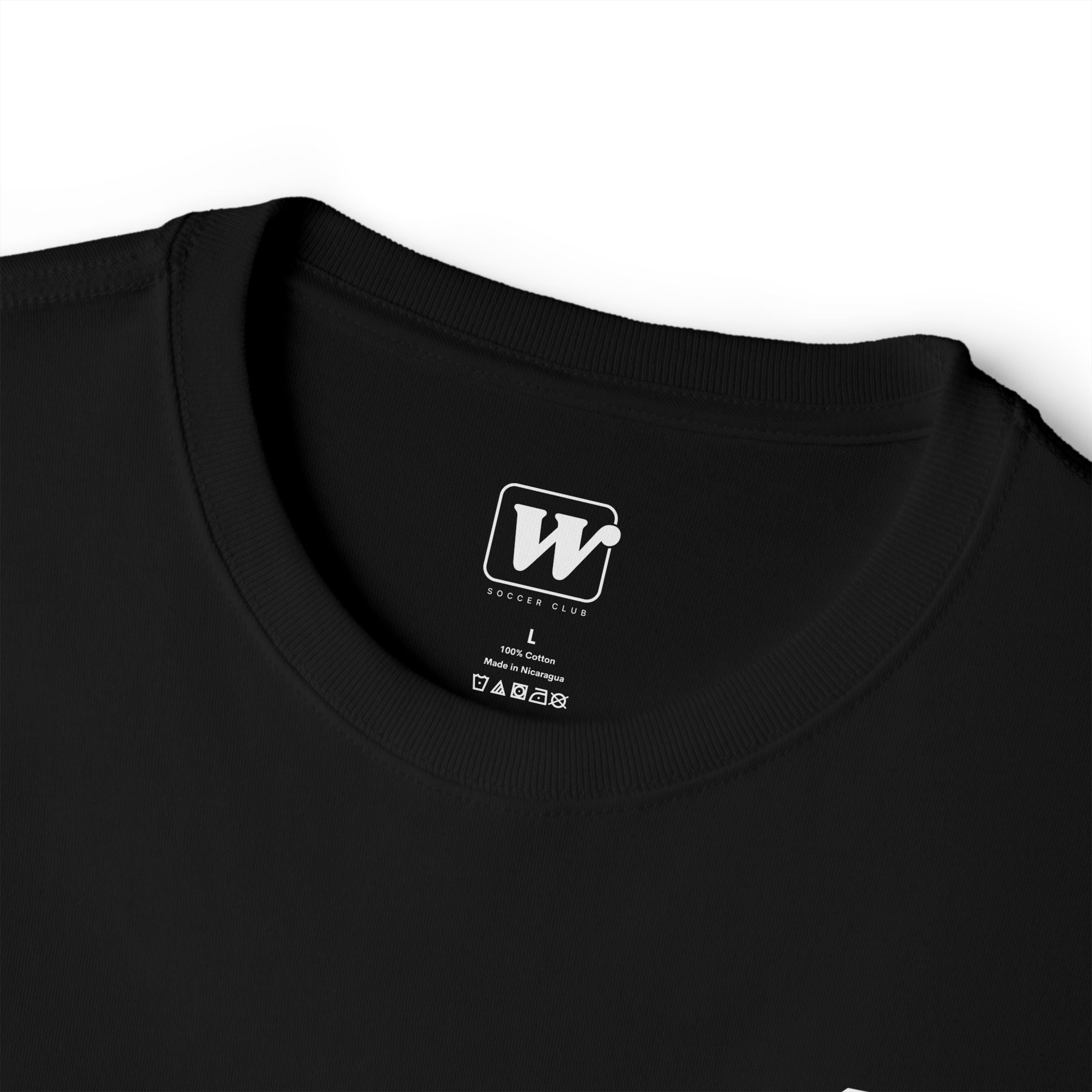 Black boxy t-shirt close-up showing the inner neck label with a small W Soccer Club logo.
