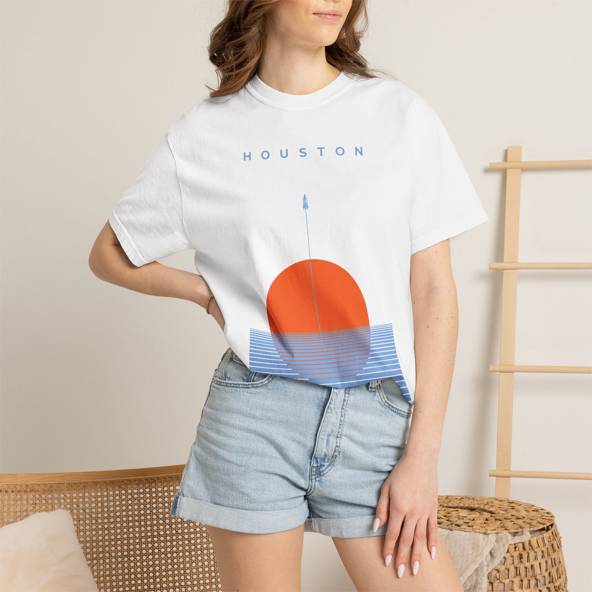White Houston Space City Sunset Soccer Graphic Tee with sunset design being worn on a model