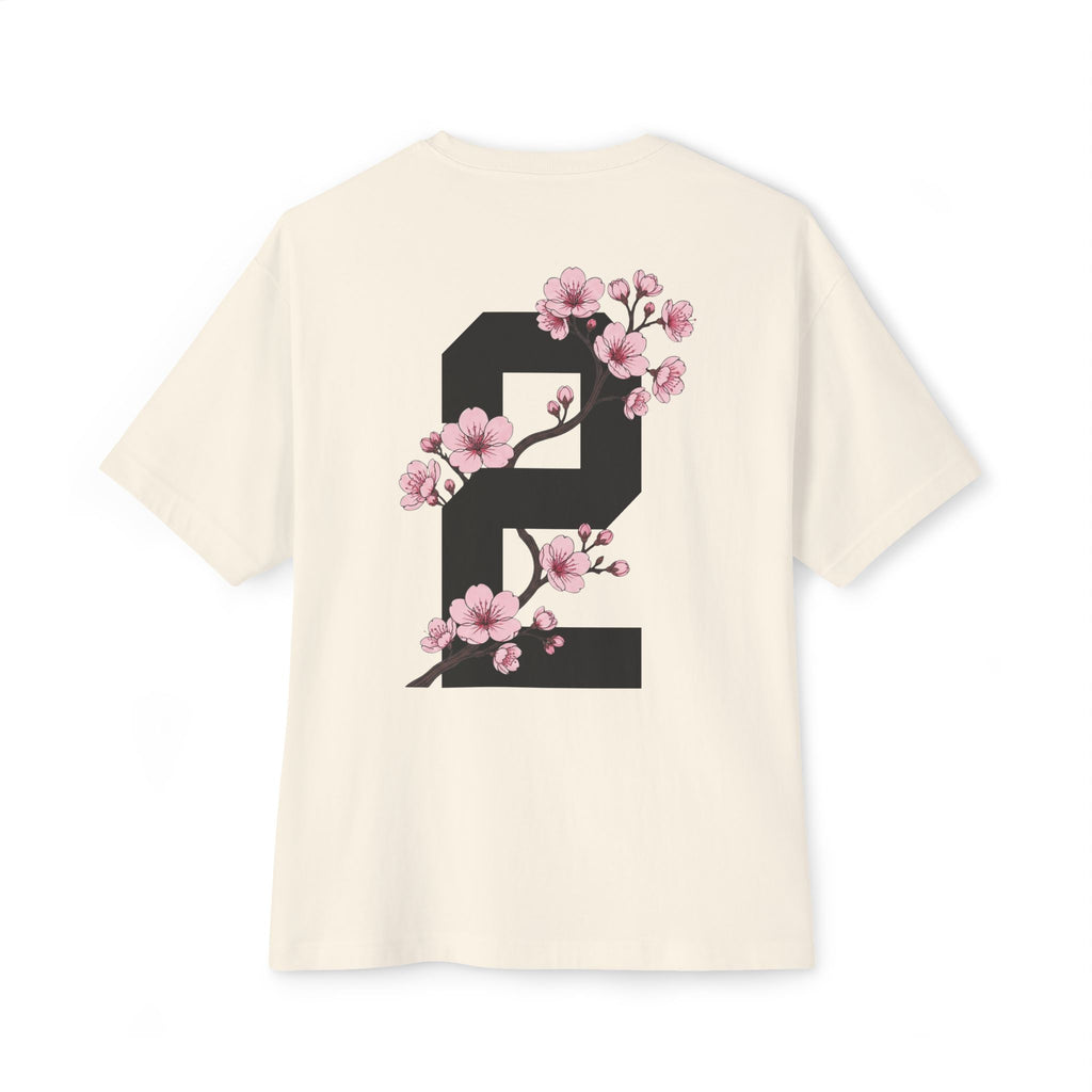 Natural heavyweight boxy t-shirt back view featuring a large number 2 graphic decorated with cherry blossom flowers.