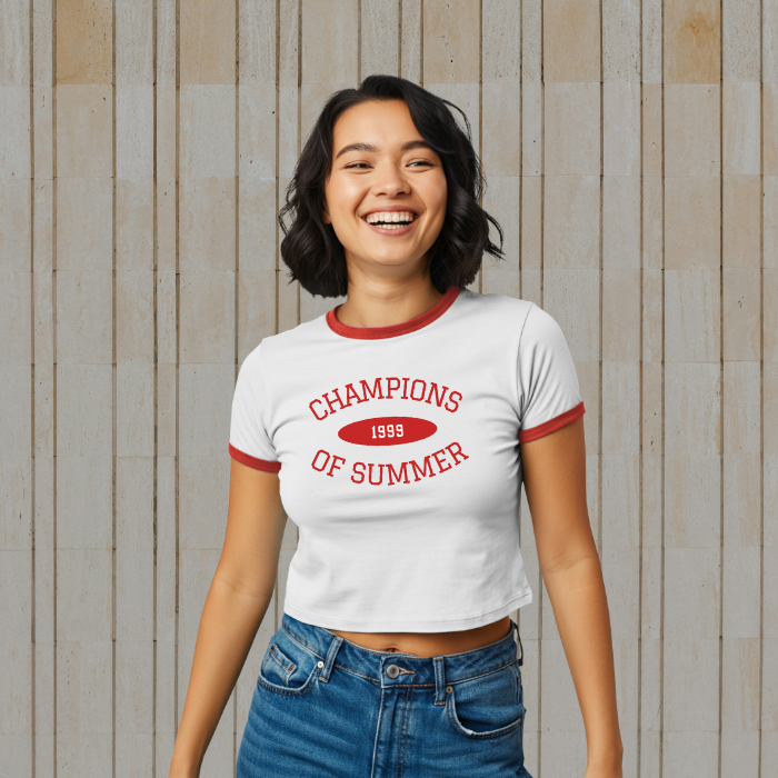 White / Red vintage style 1999 Champions of Summer women's ringer tee featuring a retro front graphic and a tournament host city list on the back